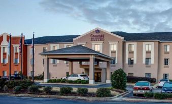 "a large building with a covered entrance and the words "" claridge suites "" on it" at Comfort Suites Gadsden Attalla