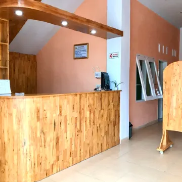 Panorama Guest House Syariah Отели в г. Каро