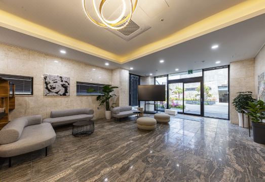 군산 더 시티호텔의 깨끗한 침실 모습