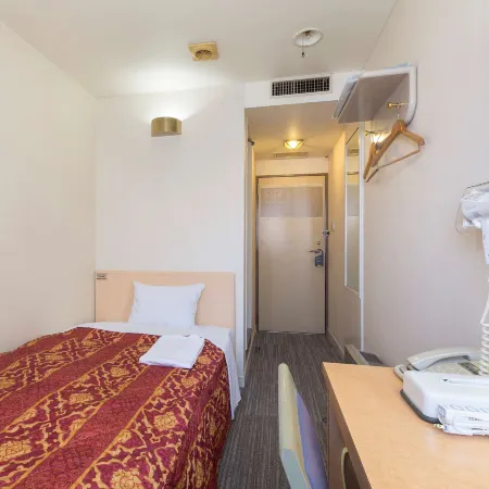 Business Hotel Palace Takamatsu Отели рядом с достопримечательностью «Башня Символ»