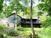 Rock Hill Retreat- a home with natural stone formations at every turn!
