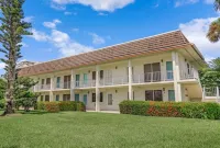 Tastefully Designed, 1st Floor Corner Condo, Steps from the Beach!