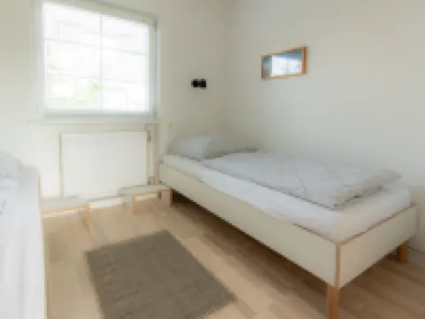 Spacious vacation apartment with garden, surrounded by greenery. Hotels in Westerdeichstrich