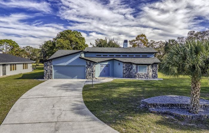 Four Beds, three baths, heated pool, and a Golf Course. What more do you need!!
