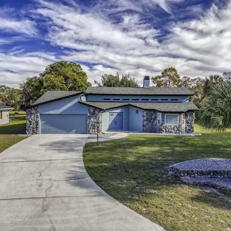 Four Beds, three baths, heated pool, and a Golf Course. What more do you need!!