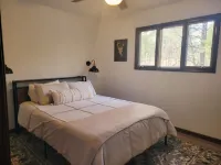 Beautiful remodeled 3 bed 2.5 bath cabin with a huge deck backing to the forest!