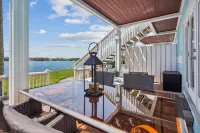 Resort style Luxury condo on the waterfront with private patio overlooking bay.