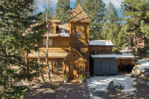 Whimsical Castle Retreat with Sauna, Fireplaces, Forest Setting Near Denver