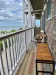 Modern beachfront condo with private deck, harbor views, and parking!