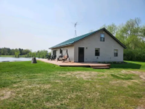 Peacefully secluded cabin on a small private lake with 55 Acres