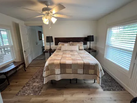 Completely renovated mobile home sitting own a pond.