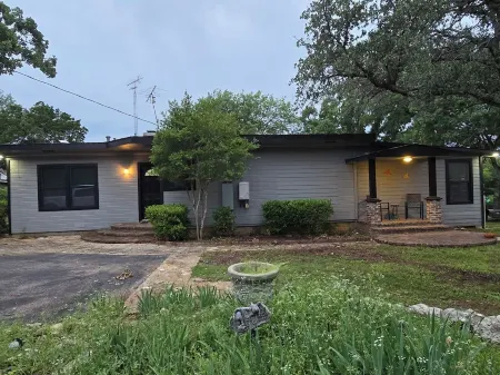 Newly Renovated 1.5 Acre Lake Front Home with Game Room and Direct Lake Access.