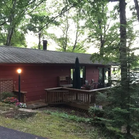 Quaint two bedroom cabin just a few steps away from and on Mountain Rest Lake.