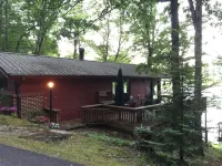 Quaint two bedroom cabin just a few steps away from and on Mountain Rest Lake.