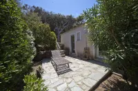 Shorefront villa offers great amenities and views giving onto the beach below Hotels in Corbara