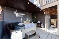 Hygge House on Lanier - the ULTIMATE lake cabin - dock, arcade, hottub, & grills