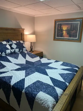 Scenic lake house with private covered dual-slip and two covered lake-view decks