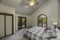 Lakefront secluded mult-family retreat with game room and two cabins.