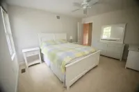 Large Bethany home private waterfront near food shops ice cream minigolf & beach