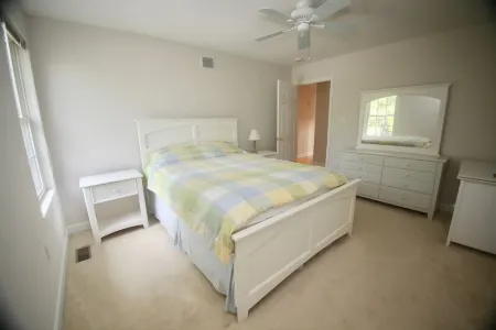 Large Bethany home private waterfront near food shops ice cream minigolf & beach