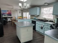 Cozy Chippewa Lake Ranch just steps from the lake! Kayaks and SUPs Private beach