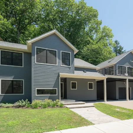AMAZING NEWER HOME WITH LAKE VIEWS, steps away from shops and restaurants.