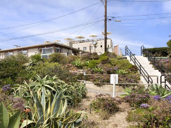 Spectacular Ocean Views! Steps to Beach! Private Patio and 1 Car Garage!