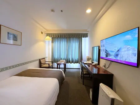 Tsuyama Kakuzan Hotel Отели рядом с достопримечательностью «Kumenosato Road Station»