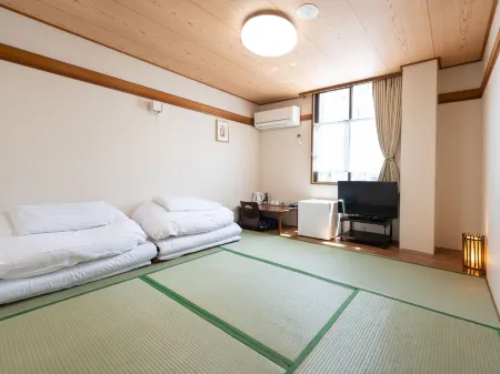 Traveller inn KOFU Отели рядом со станцией JR Zenkoji station