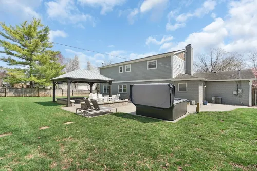 Spacious 5-bedroom house in delightful Indianapolis wit hot tub and gameroom!