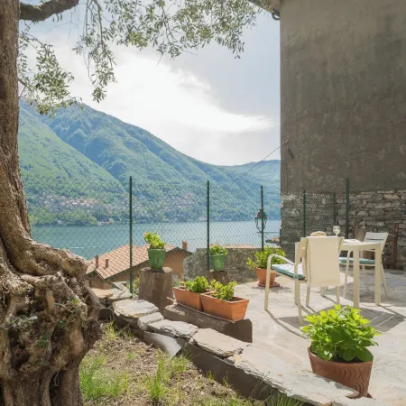 La Quiete with Private Garden by Rent All Como