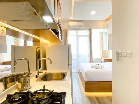 Good and Homey Studio at Vasanta Innopark Apartment Отели рядом с достопримечательностью «Bonecom Tricom Mm2100»