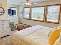 Waterfront Views and Shared Pool - Modern Coastal Retreat