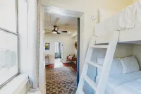 Lower-level dog-friendly home with a porch, AC, parking & washer/dryer