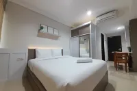 Cozy Studio Room at Patraland Amarta Apartment - Business