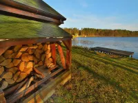 Holiday Home by Lake Rosnowskie with Boat