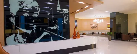 M Place at Abs by Noemi Отели рядом с достопримечательностью «Iglesia Ni Cristo Lokal Ng Templo Central»