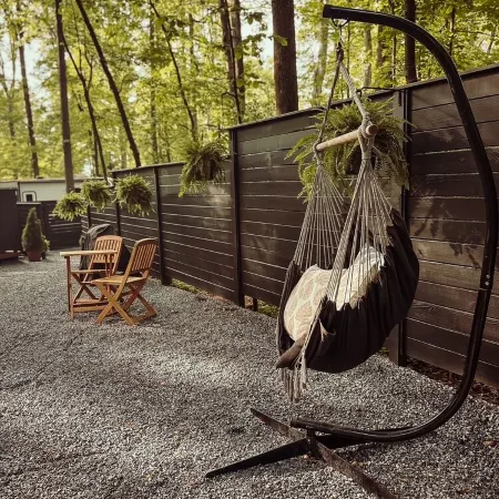 A luxurious glamping tent nestled in the trees.