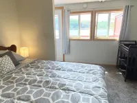 Beautiful Waterfront Cottage With a HOT TUB For Your Family Getaway!