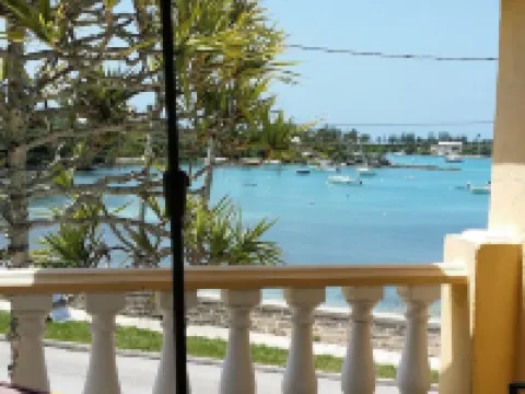Private and Dreamy.....Balcony, Wine, Sunset,  Upstairs with its own entrance! Hotels in Sandys