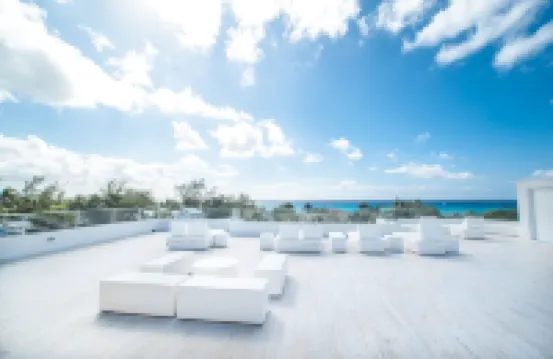 Private 7 Mile Beach Beach Club. Ocean views from Roof Terrace and Pool Pavilion
