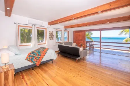 Stay at the famous Jolly Octopus Beach Bar! Beach Front with Water toys included