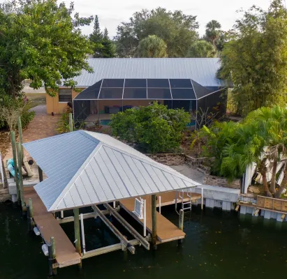 Waterfront oasis with private heated & screened pool, dock w/boat lift. 3BR/2BA