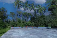 Treebo River View Resort Отели в г. Канданаколли