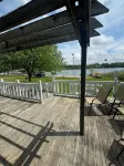 AllSports lakefront cottage. 3 bedrooms, 2 baths, private beach, yard and deck Hotels in Grattan Township