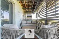 Luxury building with pond view and parking