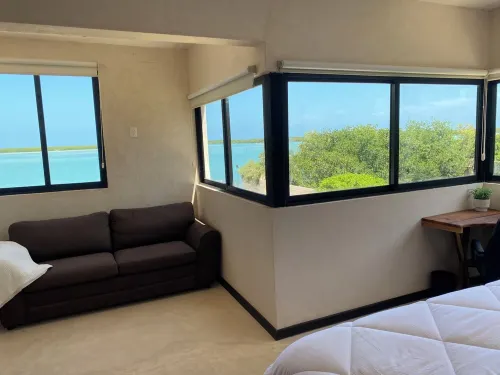 Charming 1-Bedroom Apartment in Río Lagartos. AC, Rooftop Deck & Private Pier -J Hotels in Rio Lagartos