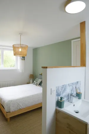 The farmhouse with the red shutters