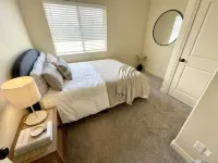 Spacious fully loaded 4-bedroom townhome sleeps 12 freeway access next to BYU Hotels in Springville