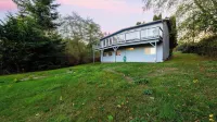 Incredible Water Views, Deck Relaxing Retreat Greenbank Getaway by Avantstay
